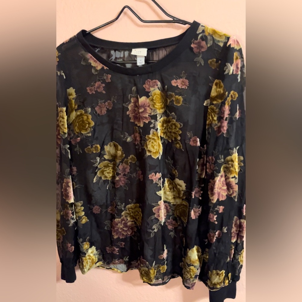 A new Day blouse with velvet textured flowers.
